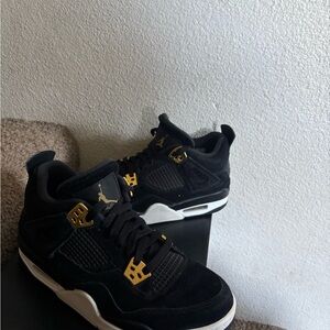 Jordan 4 retro Royalty Black and Gold Sneakers